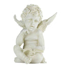 Angel reading outdoors