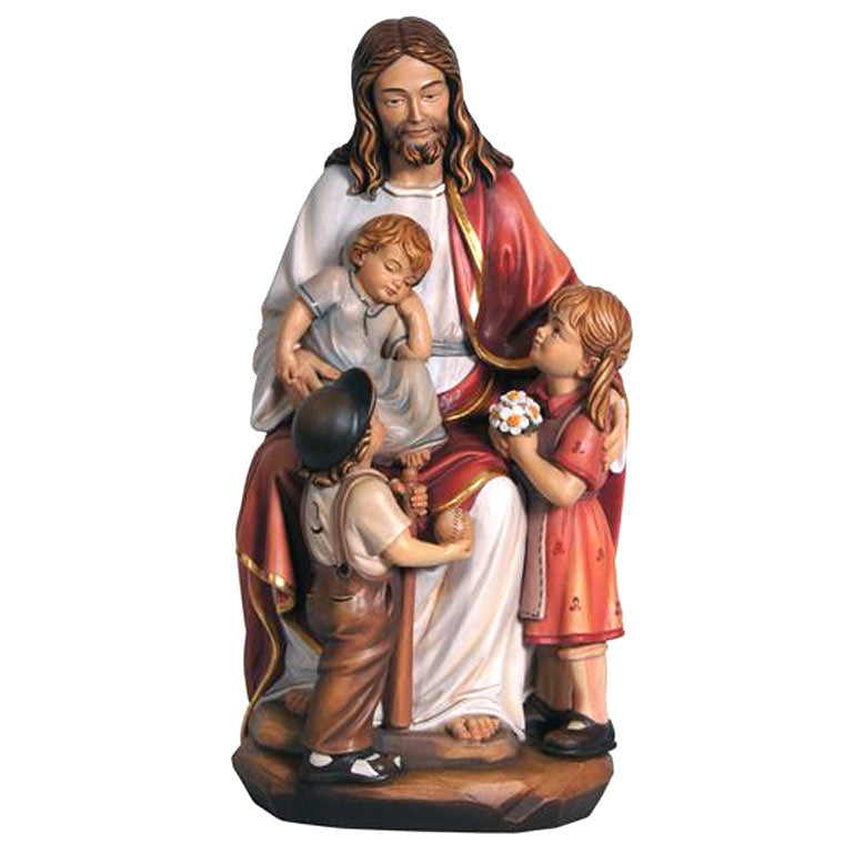Wood statue of Jesus with the children