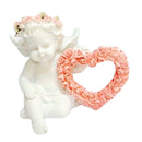 Statue of Guardian Angel with heart